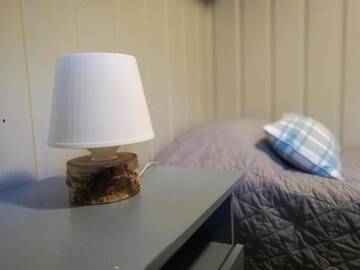 Фото номера Коттедж с 2 спальнями Дома для отпуска Ollilan Lomamajat г. Куусамо 4